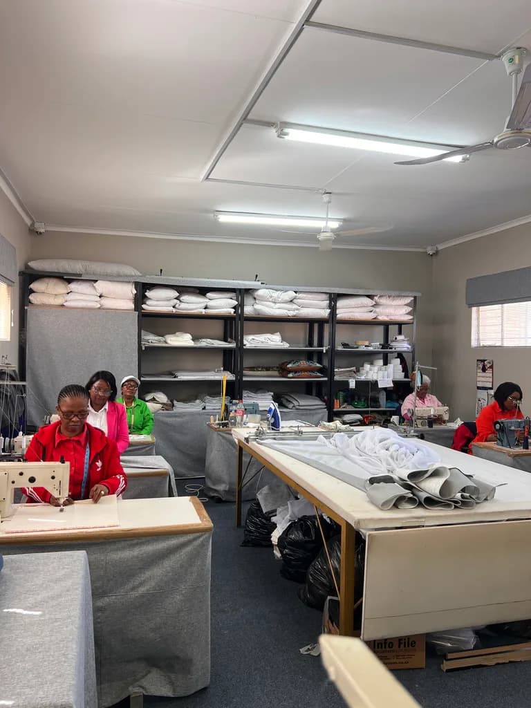 Free State Curtain Parlour team making curtains in the workshop